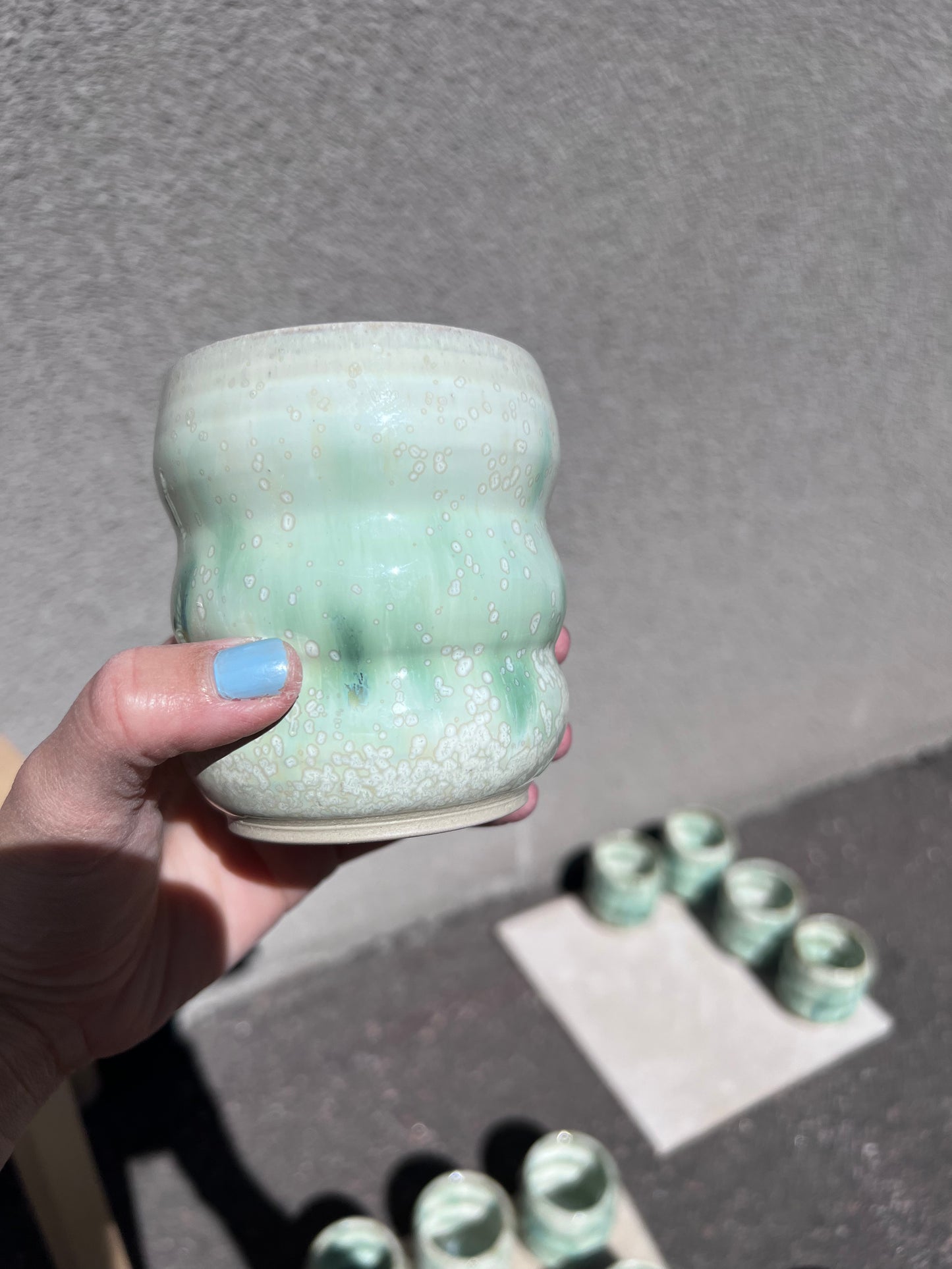Grön bubblig mugg